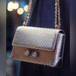 Ted Baker metallic silver leather minaudière bag.